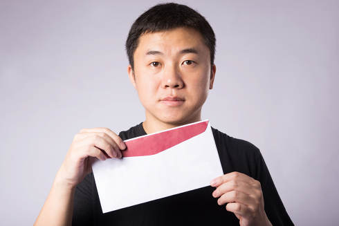 Man with open envelope | Collection Agency, Collection Laws, Statutes of Limitation