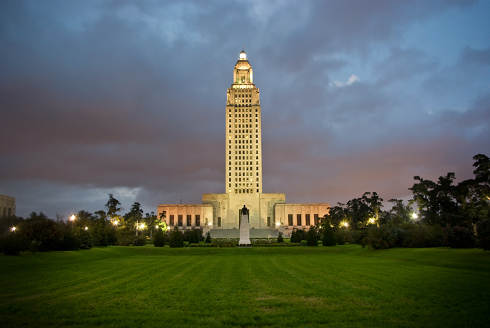 Louisiana Collection Laws | Louisiana Capitol at dusk
